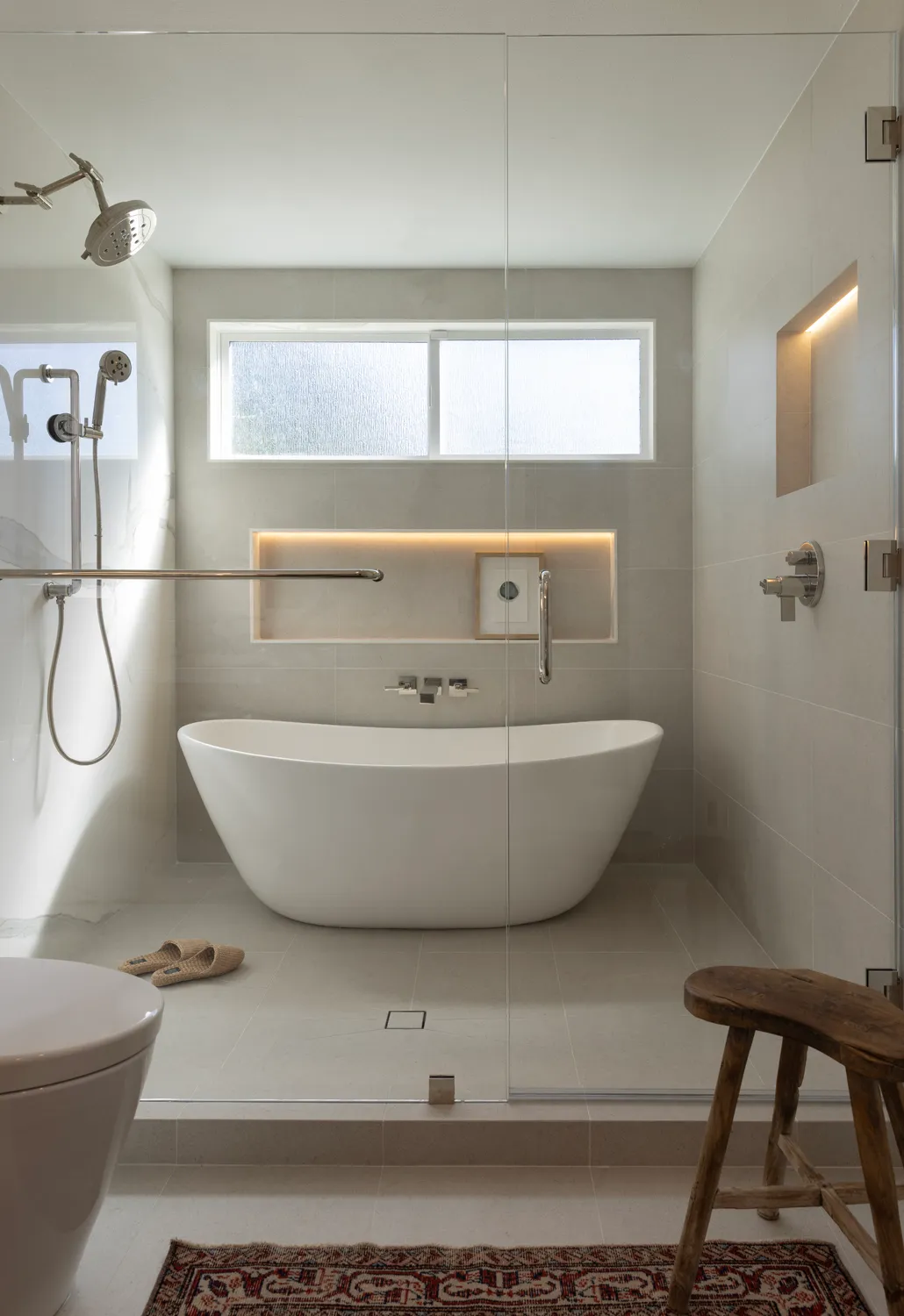 Vanity and mirror in a remodeled bathroom